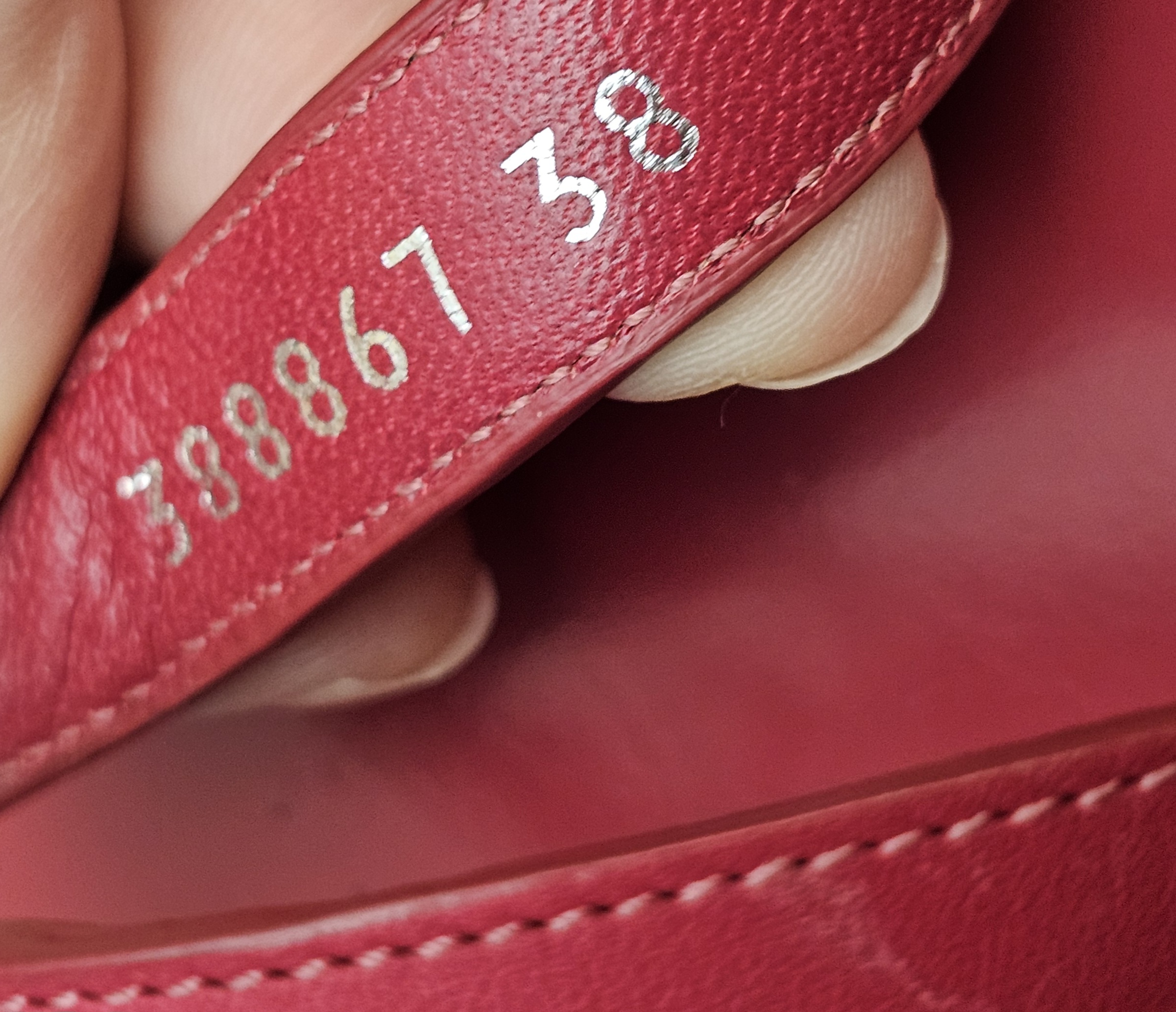 Inside of the strap stamped with the style number and size 38