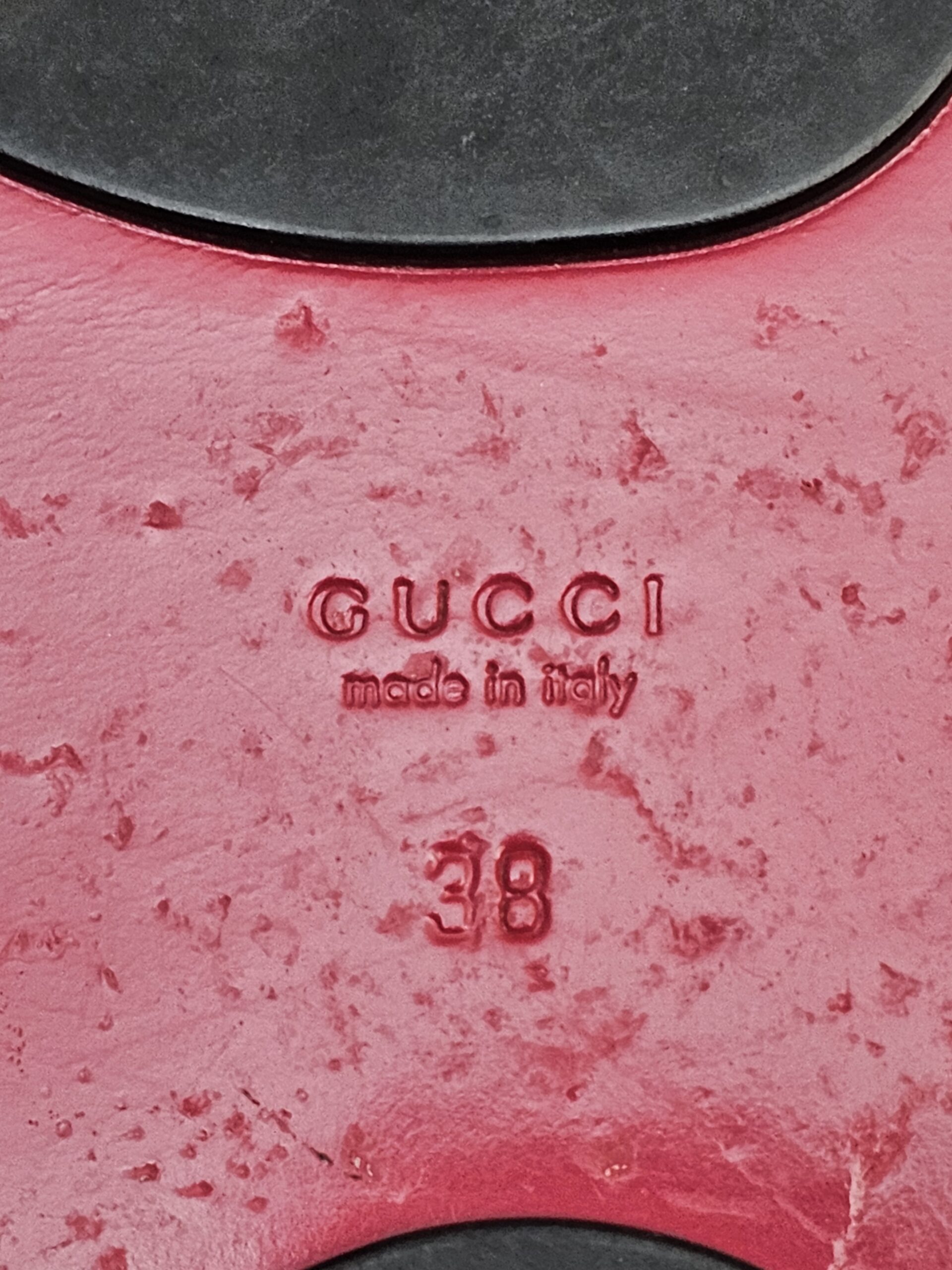 Close up of the sole stamp with size 38 and scuffs