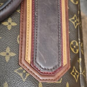 Close up of the brown leather panel showing surface scratches
