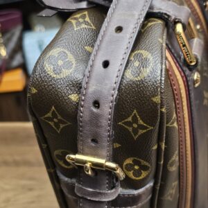 Strap buckle attached at the other side