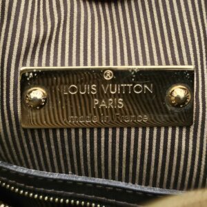 Gold-tone interior plaque reading Paris made in France