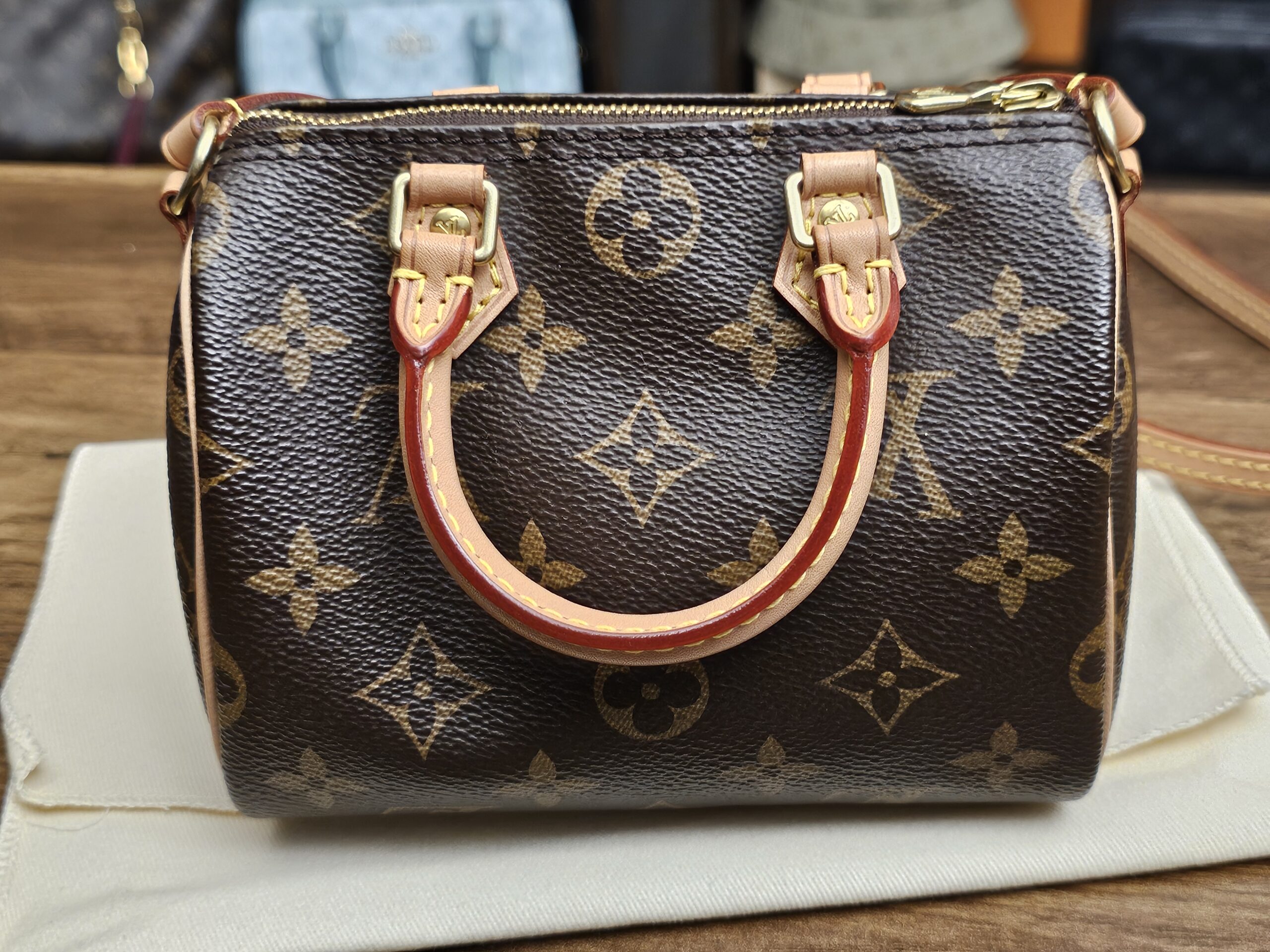 Front view with the rolled handles down