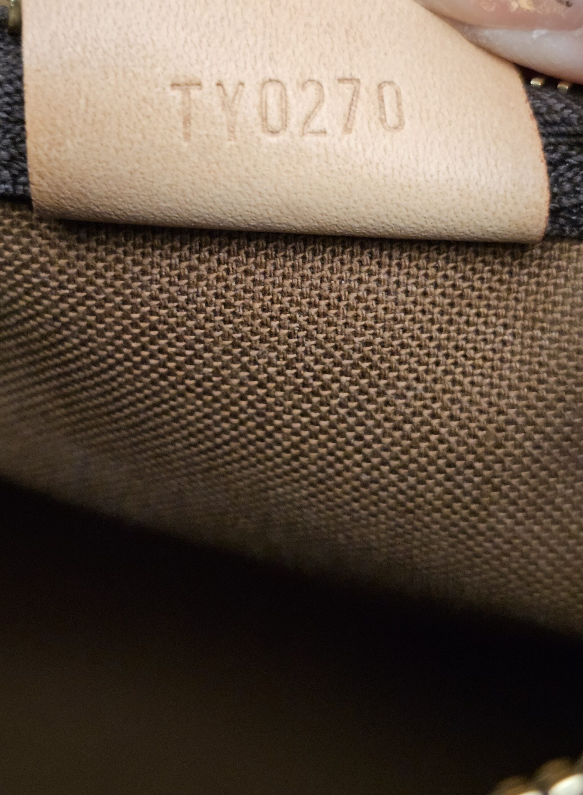 Date code TY0270 on the interior tab