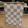 Louis Vuitton Damier Azur Passport Cover - front of the cover standing upright