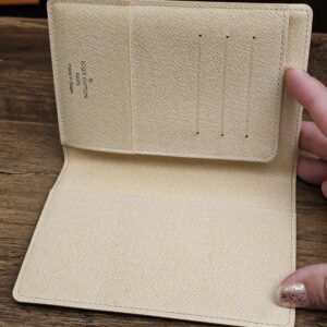 Open interior with the card slots and passport sleeve