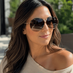 Illustrative model shot showing Louis Vuitton sunglasses worn. This is a styling reference, not a photo of the item for sale