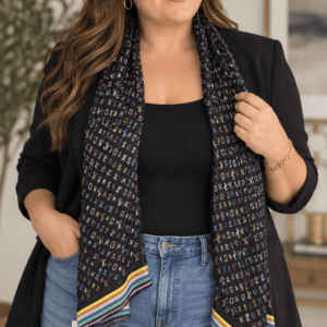 Illustrative model shot showing a Louis Vuitton Monogram Multicolor scarf worn. This is a styling reference, not a photo of the item for sale
