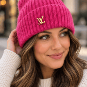 Model wearing the fuchsia pink Louis Vuitton Spark cashmere beanie