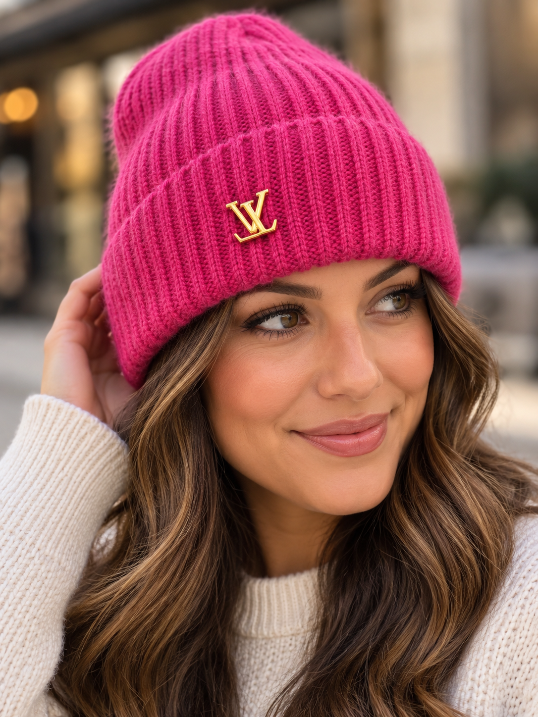Model wearing the fuchsia pink Louis Vuitton Spark cashmere beanie