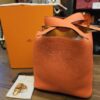 Hermes Picotin Lock 18 PM Orange Gold Hardware - front view with the Hermes box and dust bag