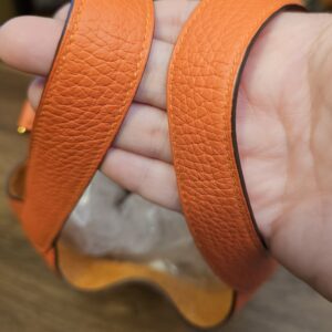 Both handles held in hand