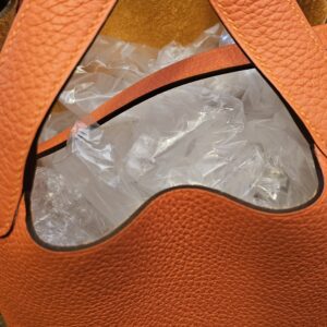 Handle attachment and suede lining from above