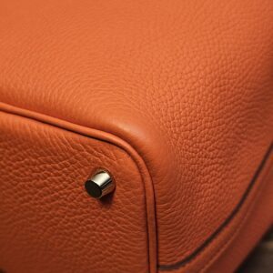 Base corner showing the grained leather