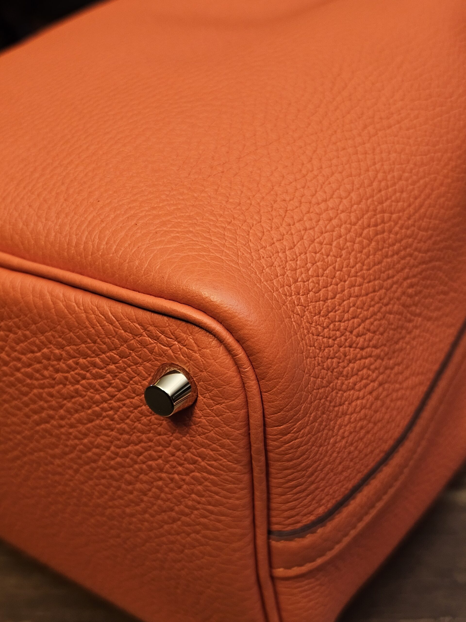 Base corner showing the grained leather