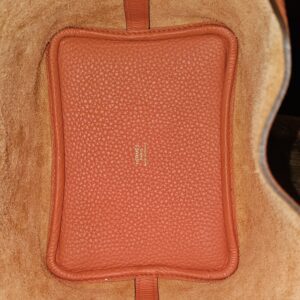 Leather base panel inside the bag