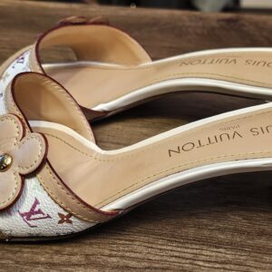 Other side of the pair with the flower applique strap