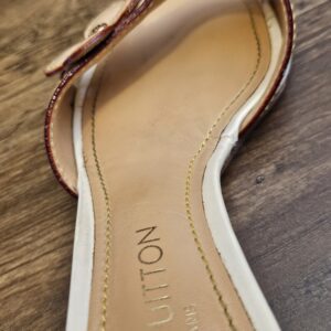 Insole stamped LOUIS VUITTON PARIS showing light wear