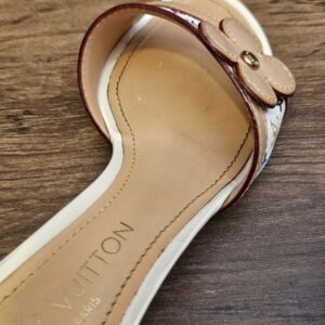 Insole of the other mule showing creasing from wear