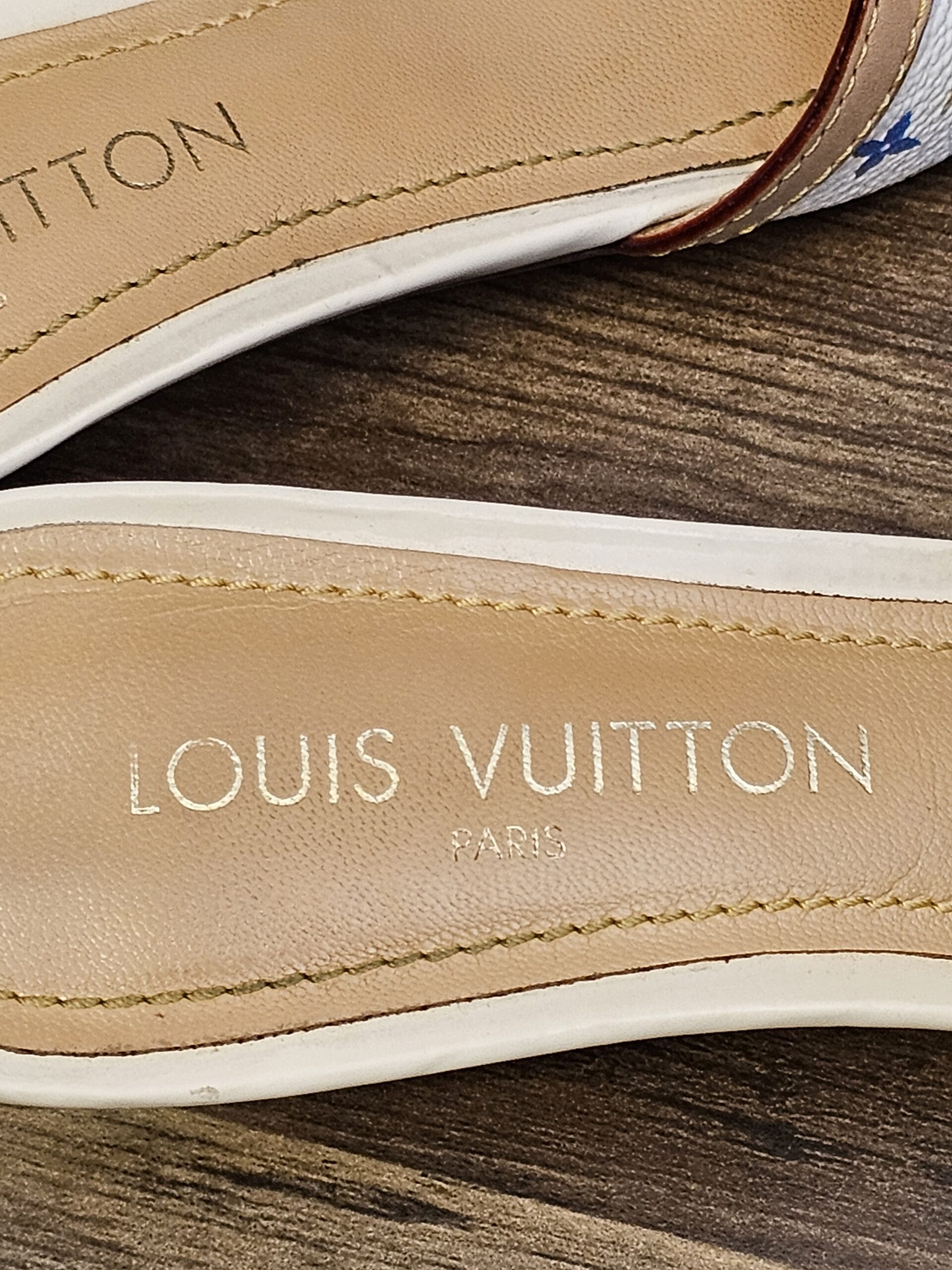 Close up of the LOUIS VUITTON PARIS insole stamp