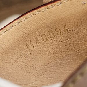 Code MA0094 stamped inside the strap lining