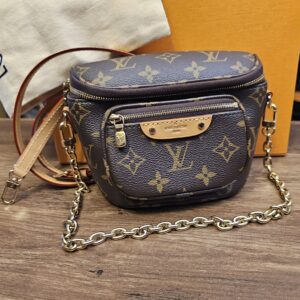 Louis Vuitton Monogram Mini Bumbag - front view with the gold-tone chain and leather strap, box and dust bag