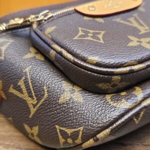 Close up of the front pocket and its leather trim