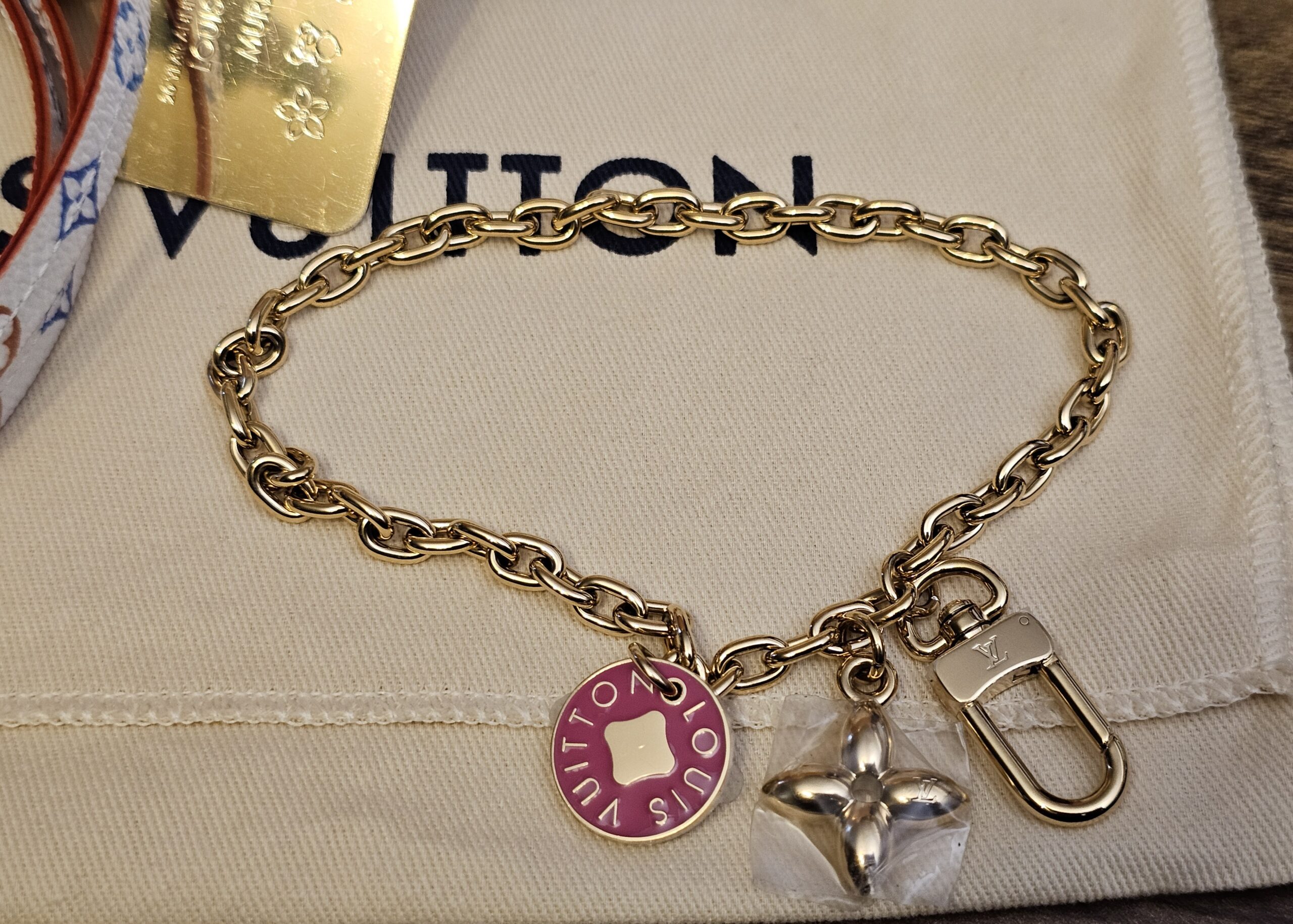 Removable LV charm chain with pink enamel medallion and flower charm