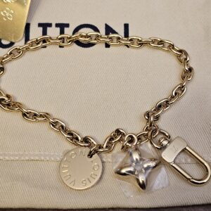 Back of the charm chain showing the gold-tone medallion