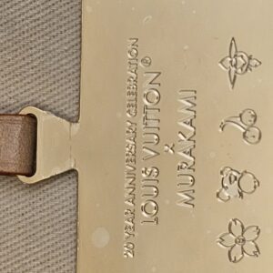 Close up of the tag reading 20 Year Anniversary Celebration Louis Vuitton x Murakami
