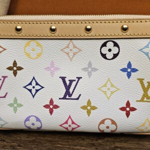 Front of the pochette showing the studded leather trim