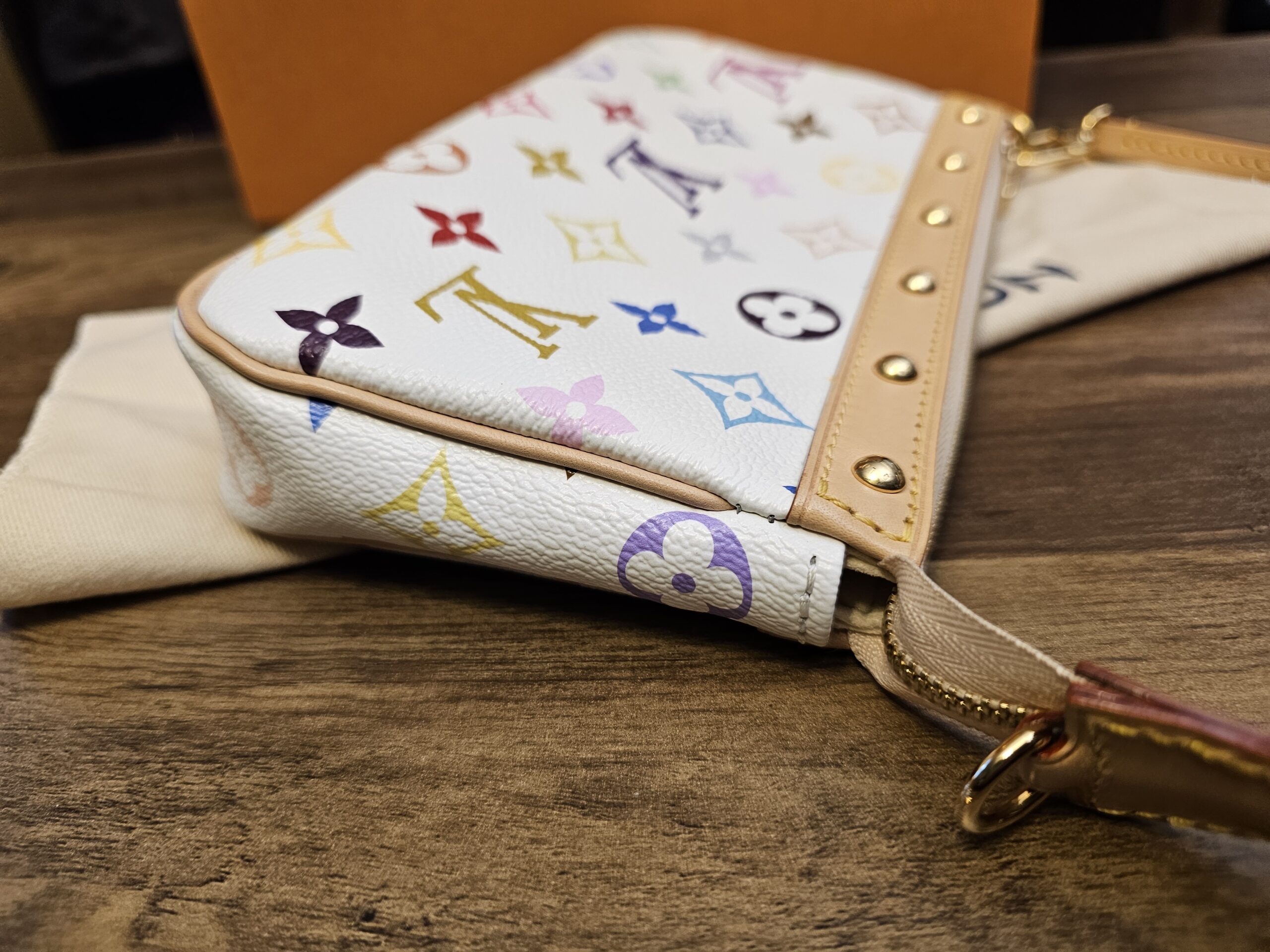 Other end of the pochette with the studded trim