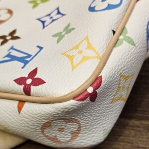 Lower corner of the canvas and leather piping