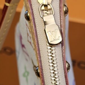 Gold-tone zip and LV zip pull along the top