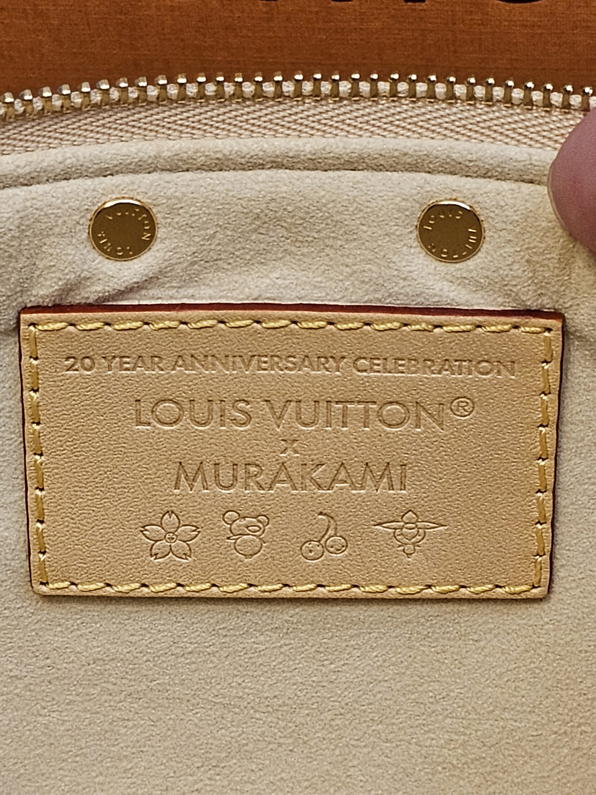 Interior leather patch stamped 20 Year Anniversary Celebration Louis Vuitton x Murakami