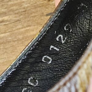 Date code SC 0129 stamped inside the lining