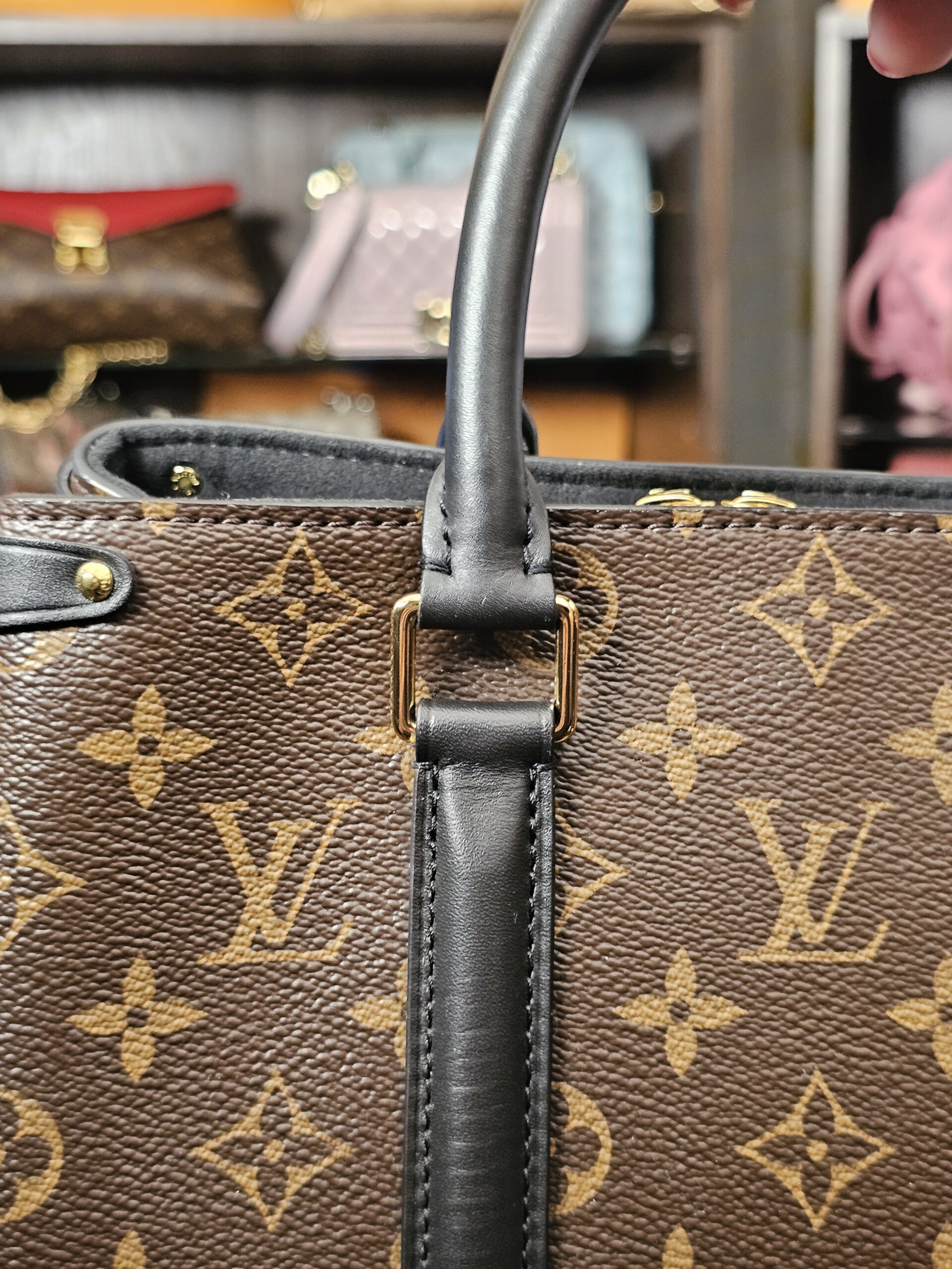 Close up of a rolled handle and its leather tab
