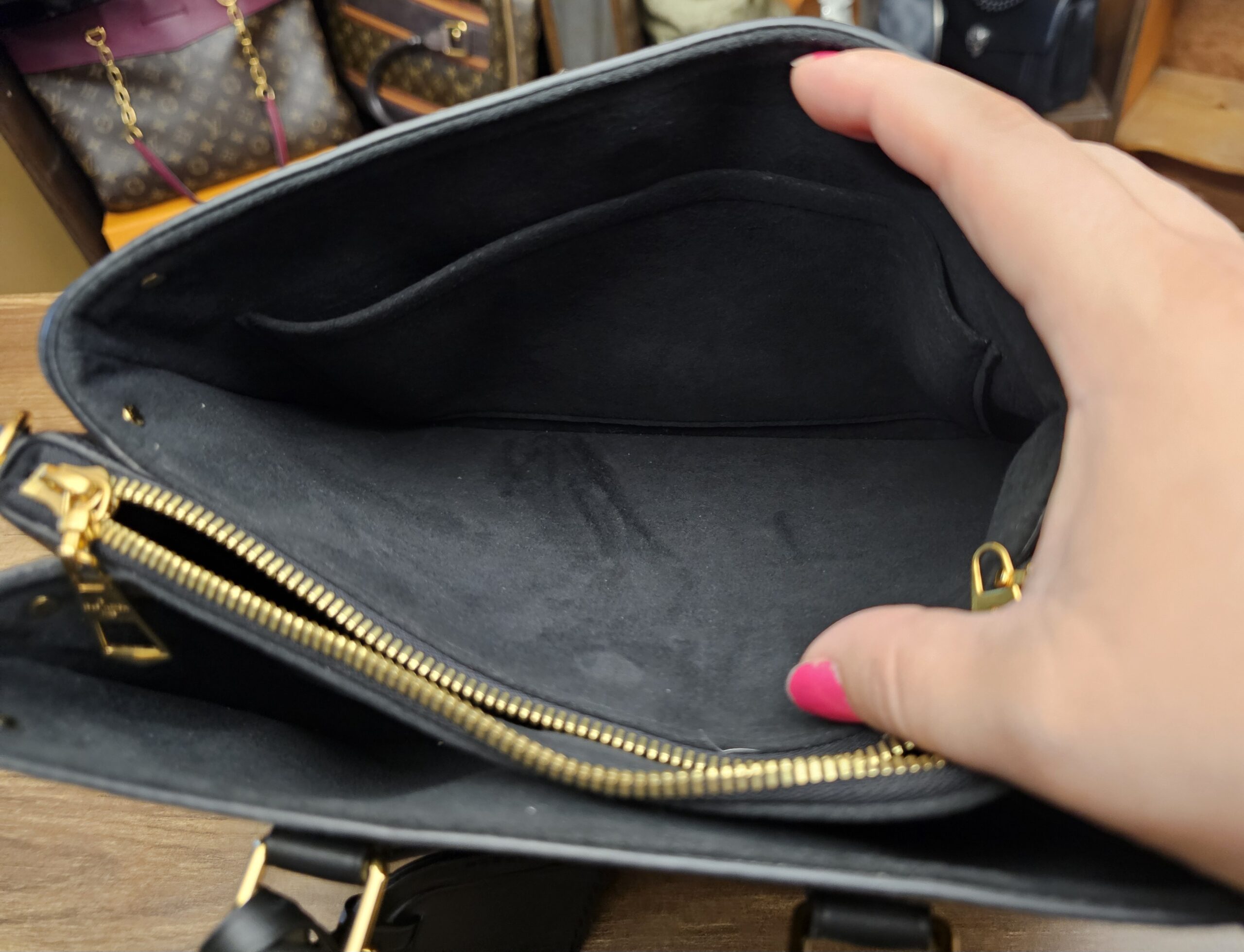 Inside a side compartment showing the black lining