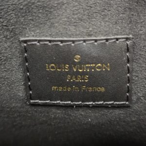 Interior heat stamp reading LOUIS VUITTON PARIS made in France