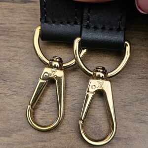 Strap clasps engraved with the LV logo