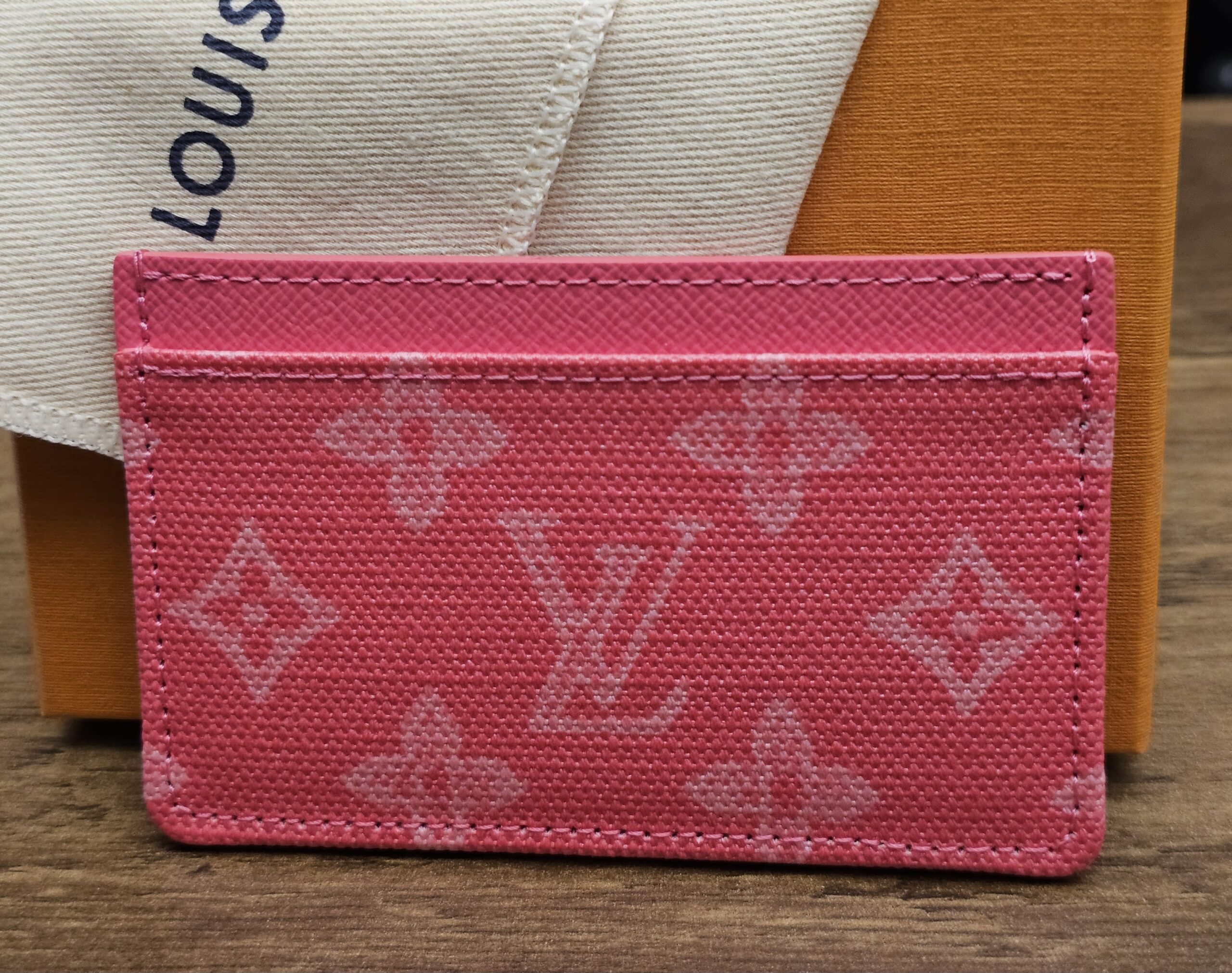 Other side of the card holder in pink Monogram Origine canvas