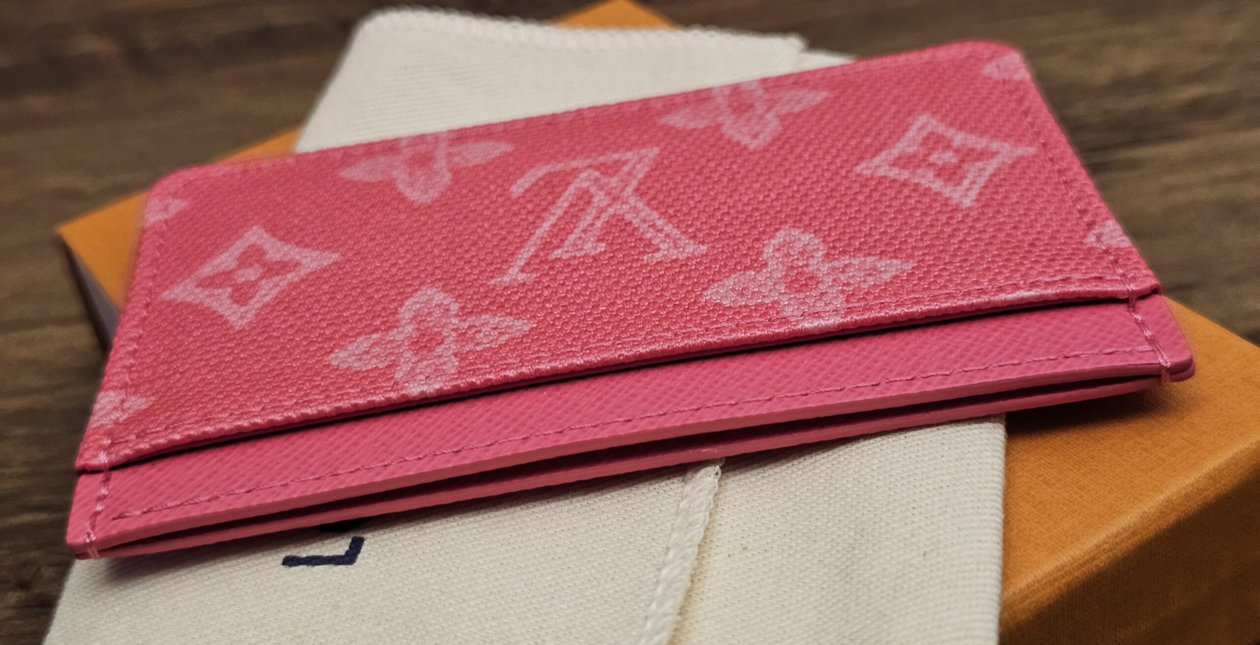 Card holder lying flat showing the exterior card slot