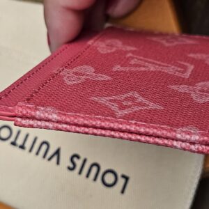 Edge view showing the stitched card slots