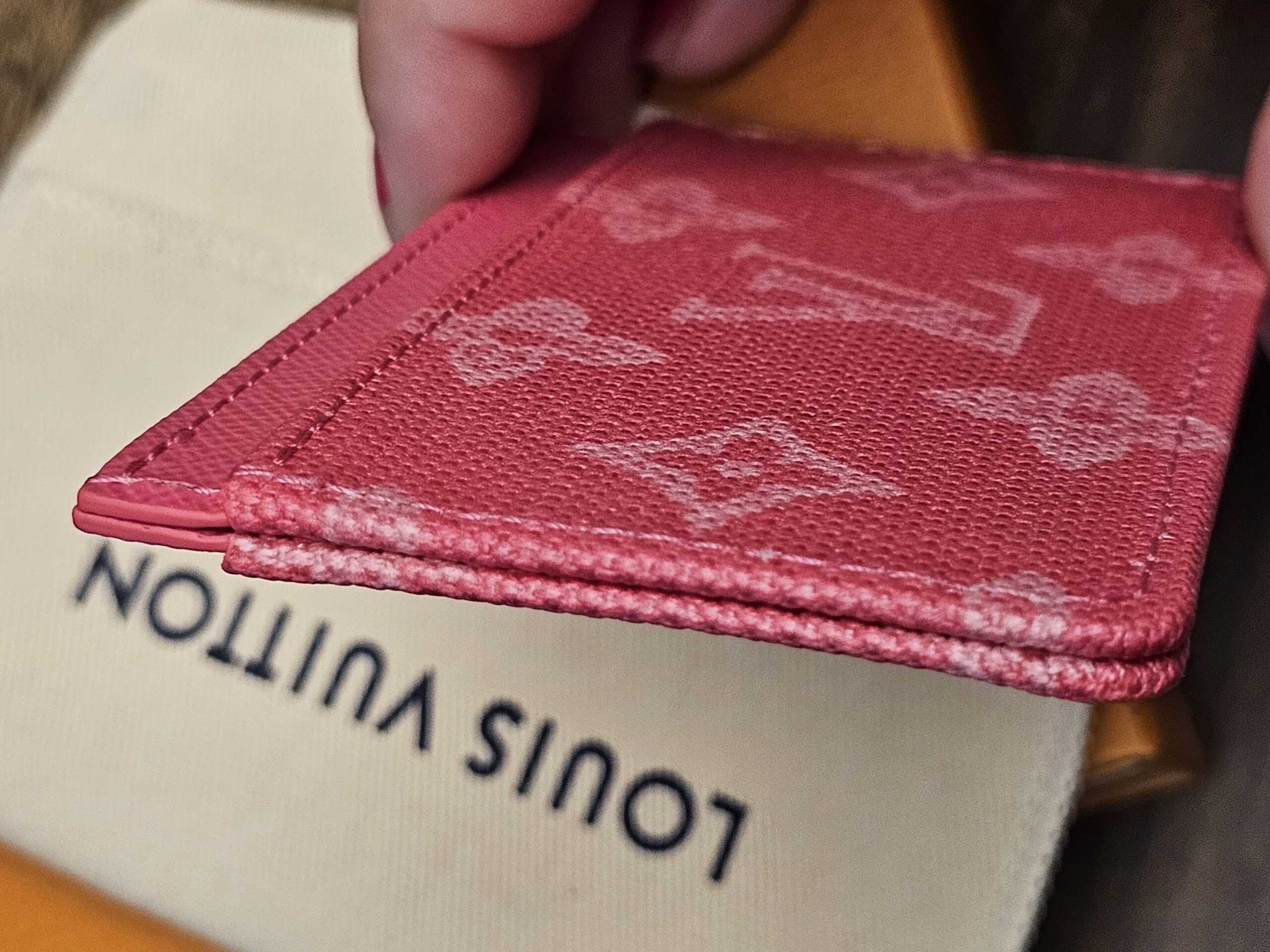 Edge view showing the stitched card slots