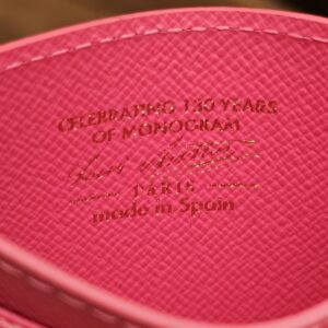 Inside stamp reading Celebrating 130 Years of Monogram, Louis Vuitton Paris, made in Spain