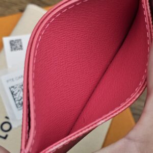Center pocket opened wide with clean pink leather