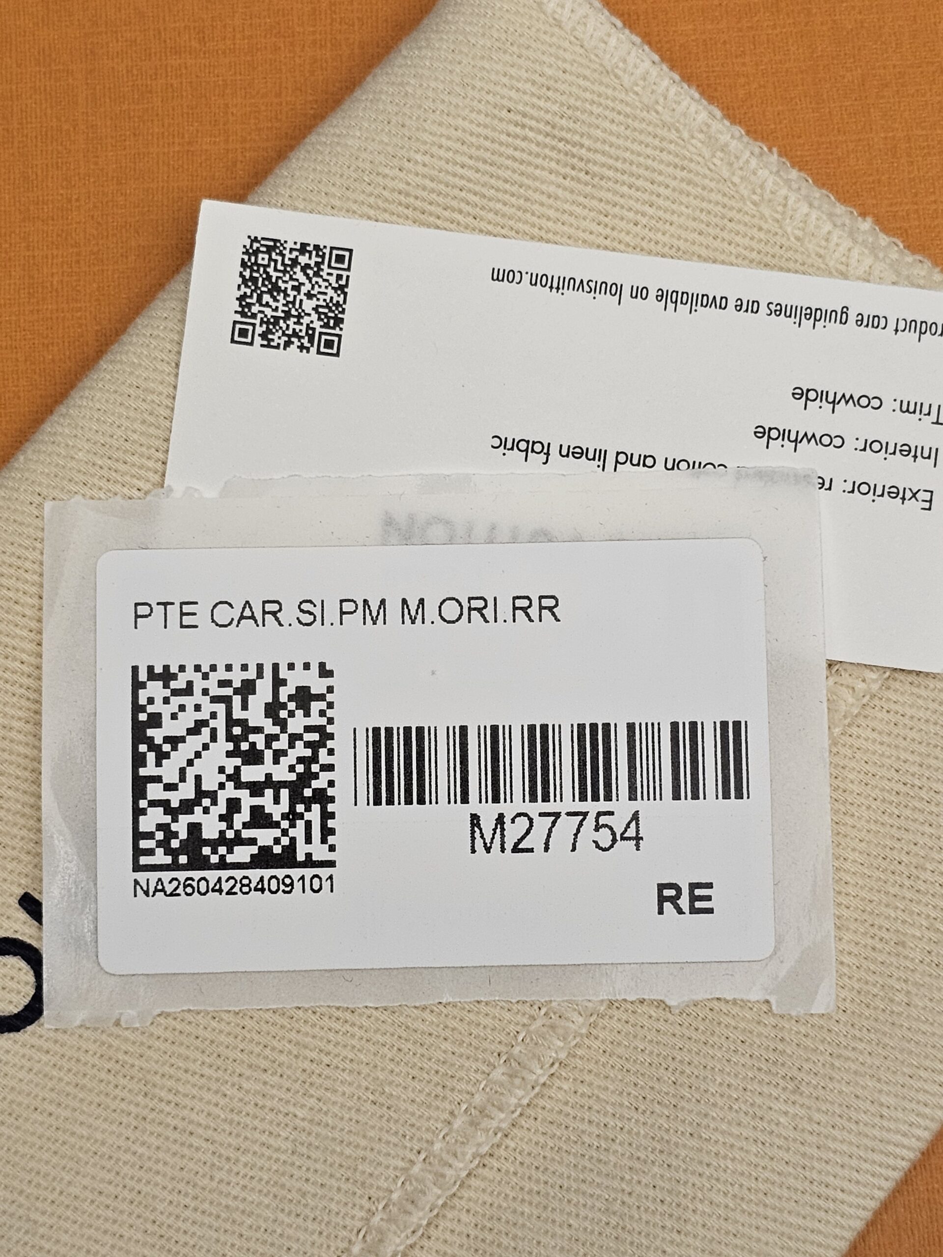 Retail tag with style number M27754