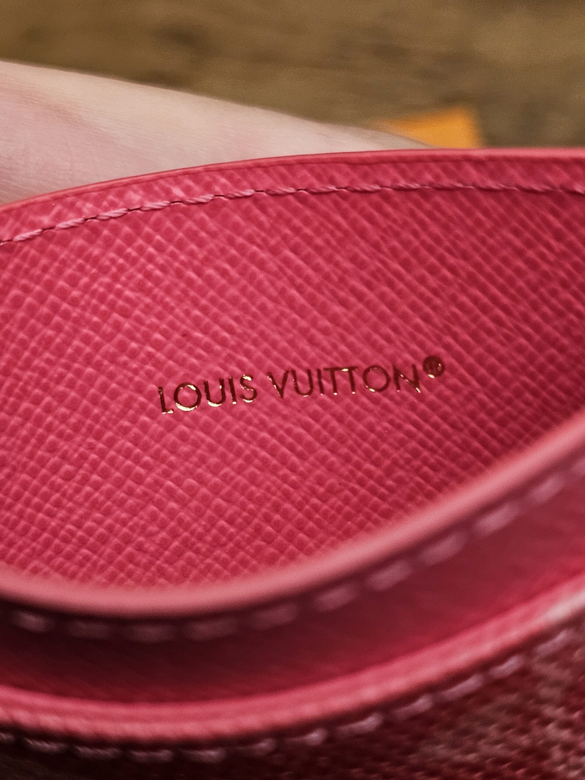 LOUIS VUITTON stamp inside a card slot