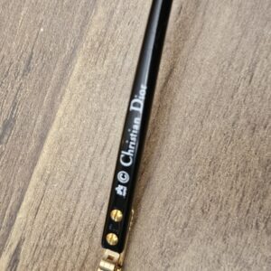Christian Dior logo printed on the black temple arm