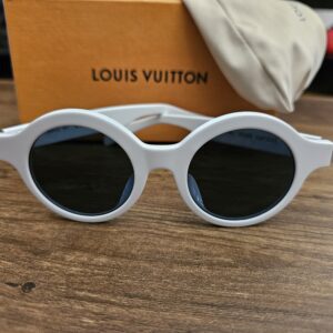 Louis Vuitton x Supreme Z0991E Downtown Sunglasses White Gold - front view of the round white frame and dark lenses