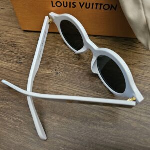 Sunglasses with the temples open seen from above